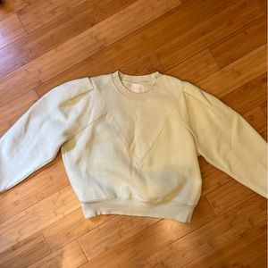 Light yellow crew neck sweatshirt